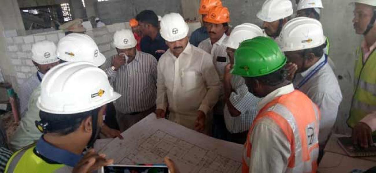 Minister Kollu Ravindra visited the city court complex site on Friday