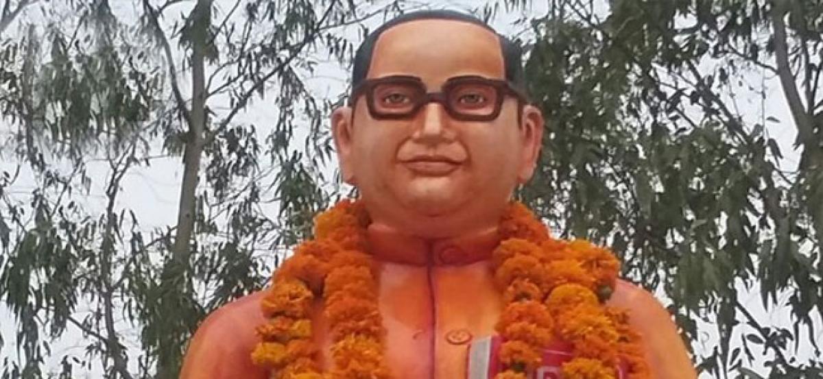 UP: Ambedkars statue rebuilt, painted in saffron