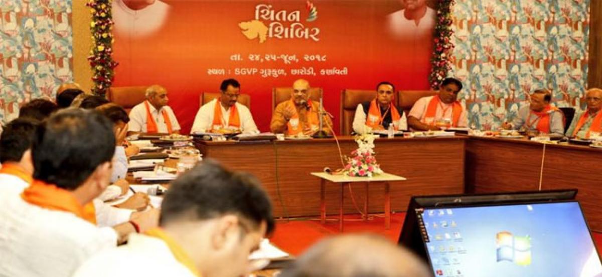 Strive hard to win all 26 LS seats in 2019: Amit Shah to Gujarat BJP workers