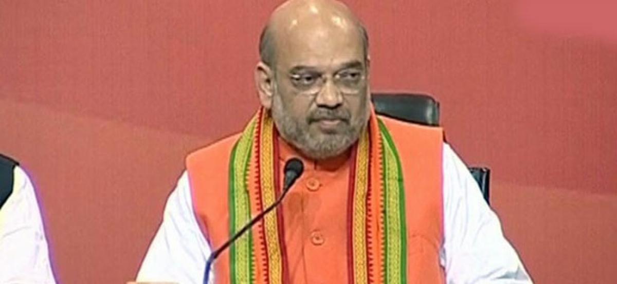 Congress trying to form govt on basis of bogus voter cards: Amit Shah