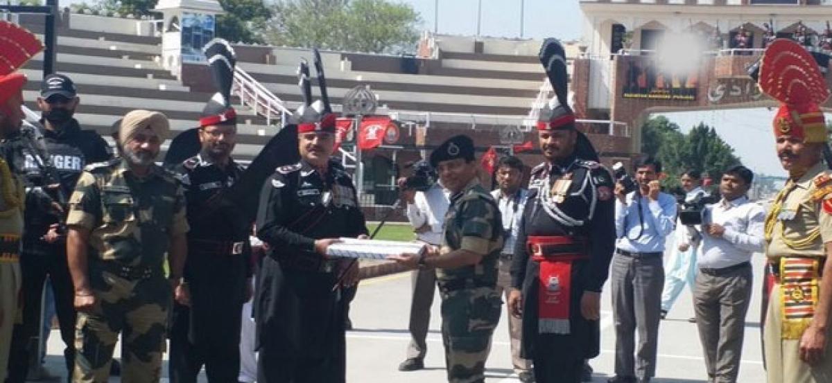 India, Pakistan armies exchange sweets on Pak Day