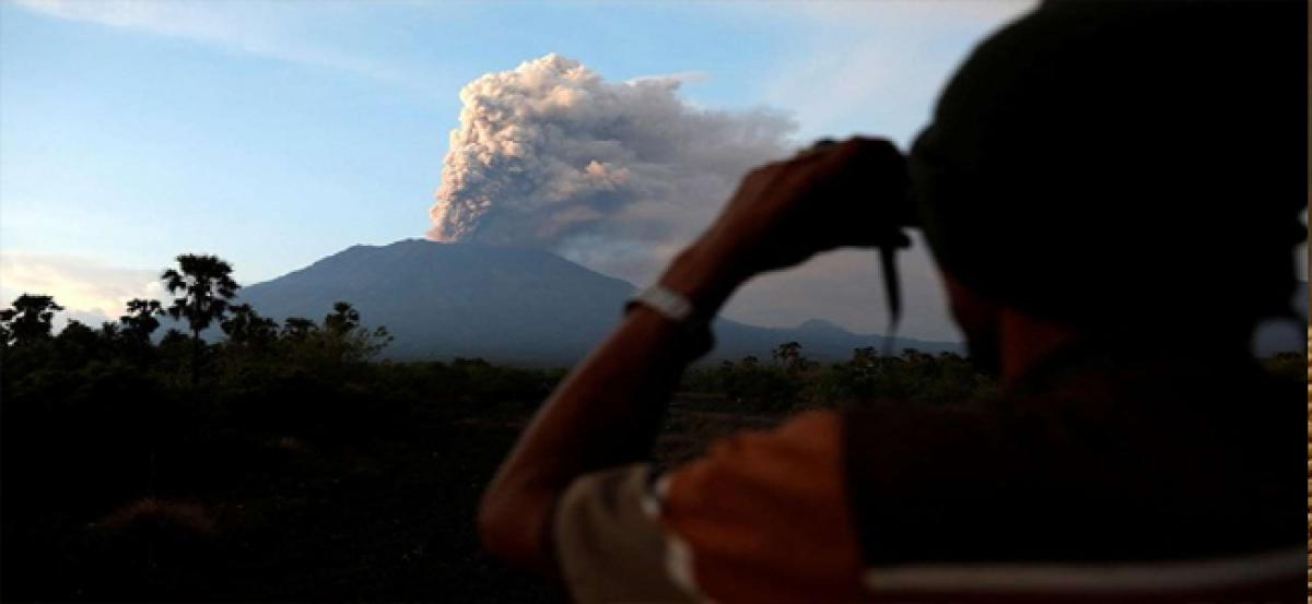 Ash from erupting volcano shuts airport in Indonesias Bali, 48 flights cancelled