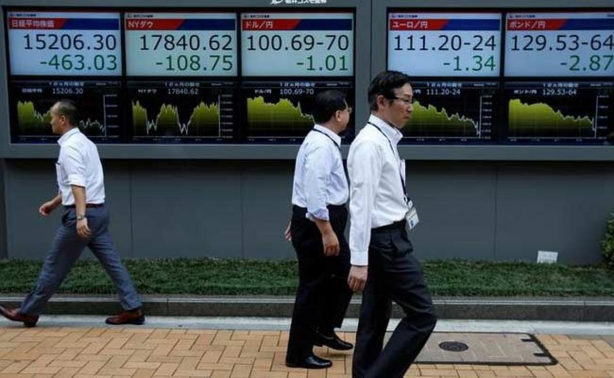 Asia stocks hit decade-high on global equity surge, dollar sags