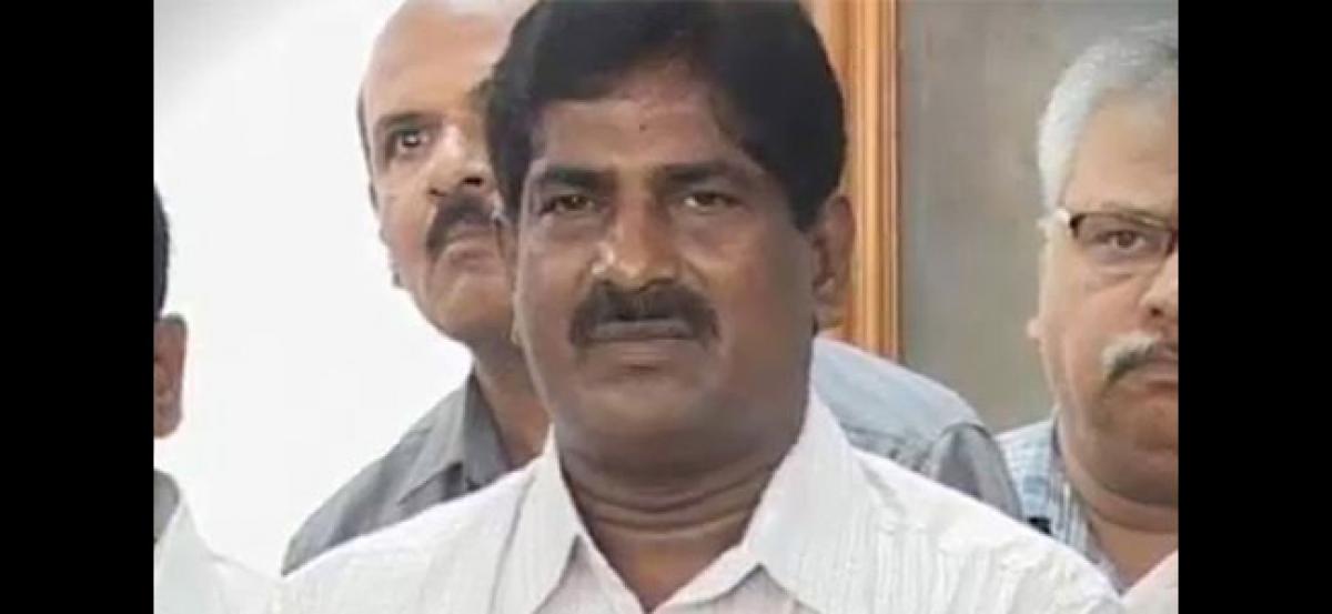 AP BJP Demands Removal Of Ashok Babu From Govt Services