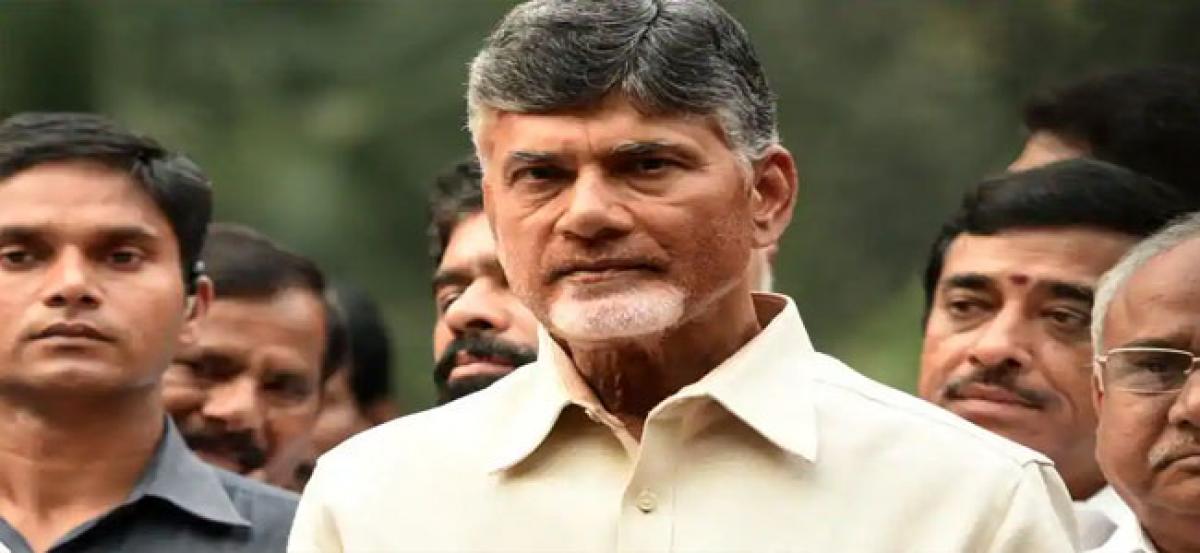 Chief Minister N Chandrababu Naidu pats revenue department staff