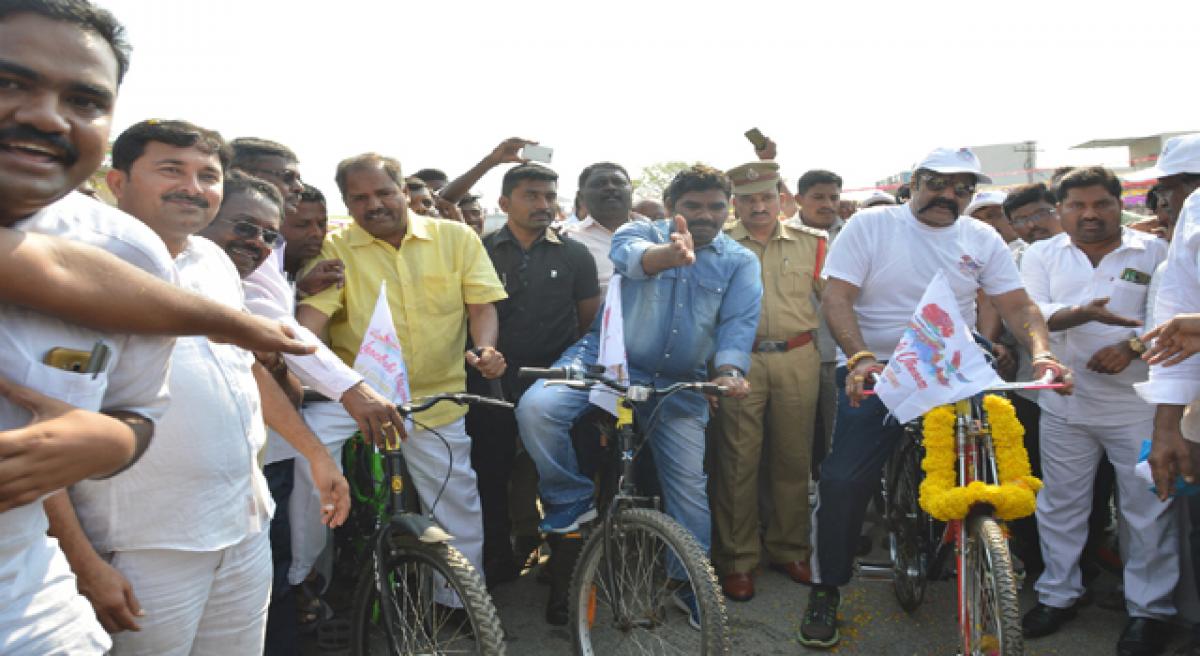 Balakrishna rides cycle to create awareness on Lepakshi Festival