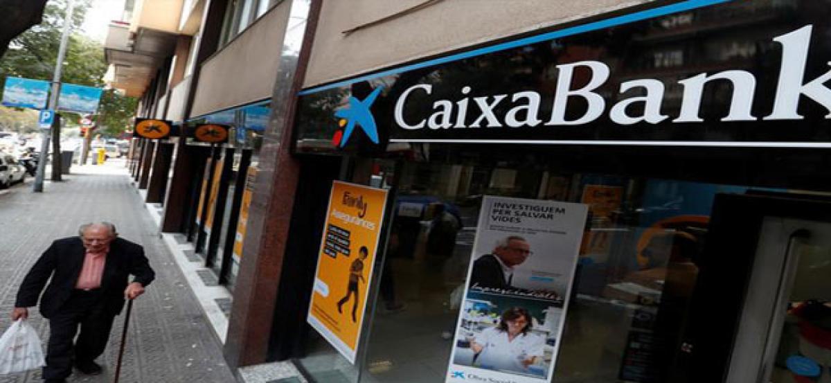 Spains third largest bank to exit Catalonia