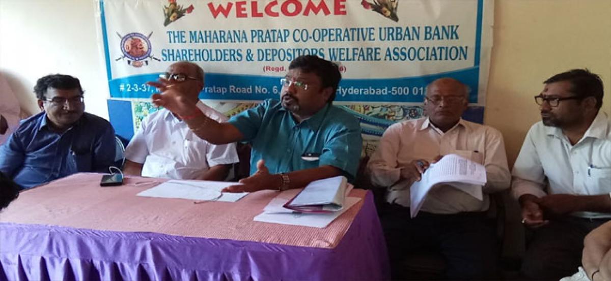 Shareholders demand action against Maharana Pratap Cooperative Urban bank general body