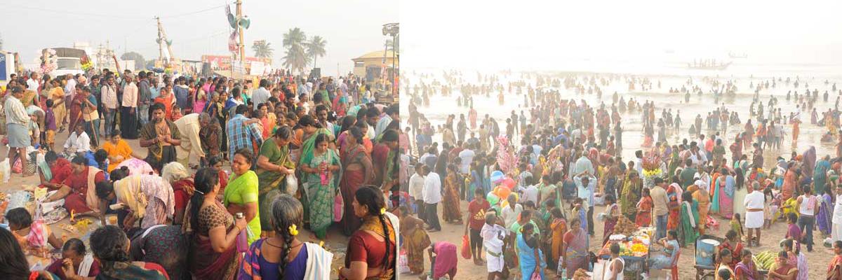 Lakshs of devotees take holy dip at Suryalanka Beach