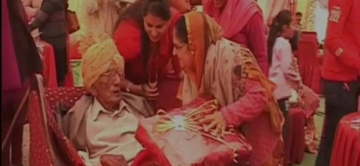 Former Army man celebrates 100th birthday with family