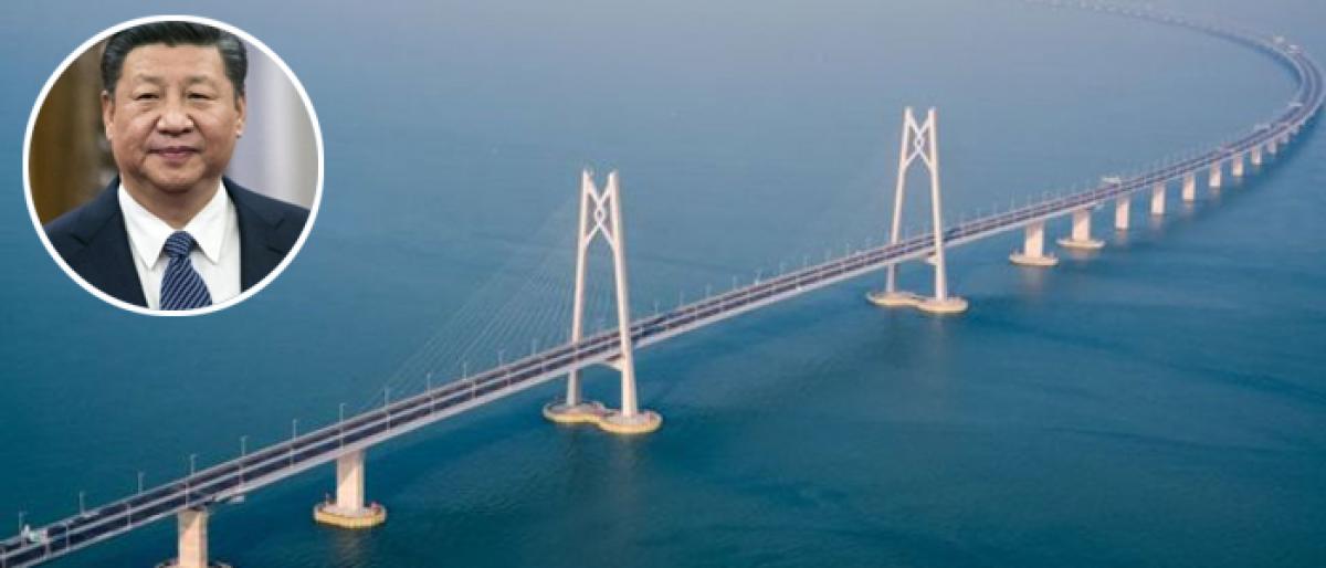 Chinese President opens worlds longest sea-crossing bridge