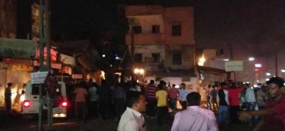 Three-storey building collapses in Gujarat