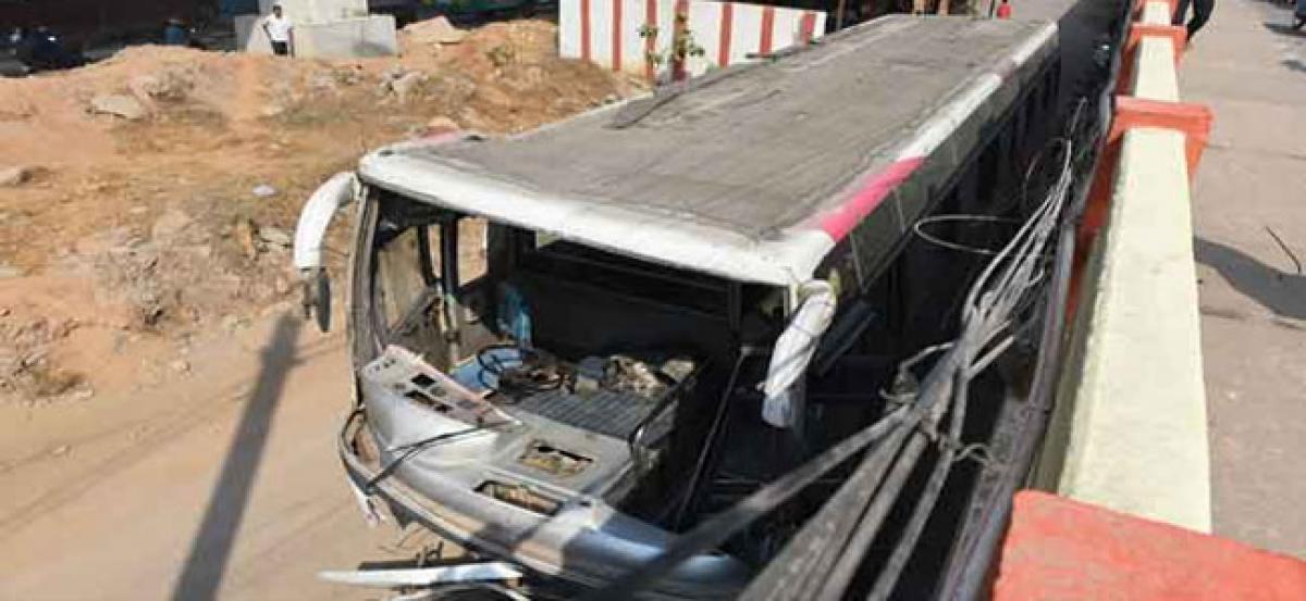 Private Bus carrying 40 employees falls off flyover in Hyderabad