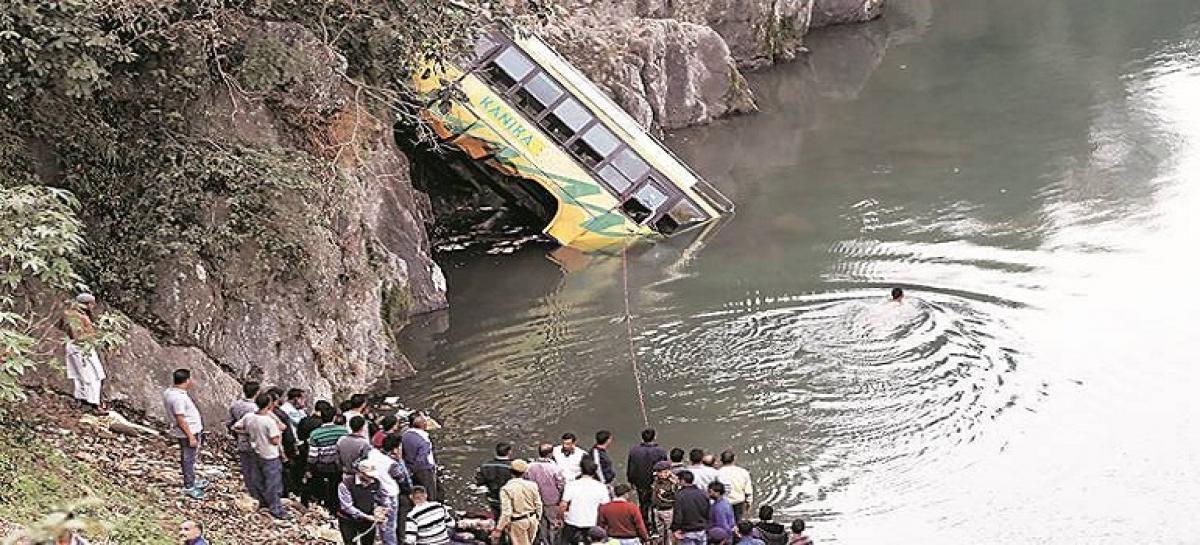 Private Bus carrying 40 passengers falls into canal in Nalgonda