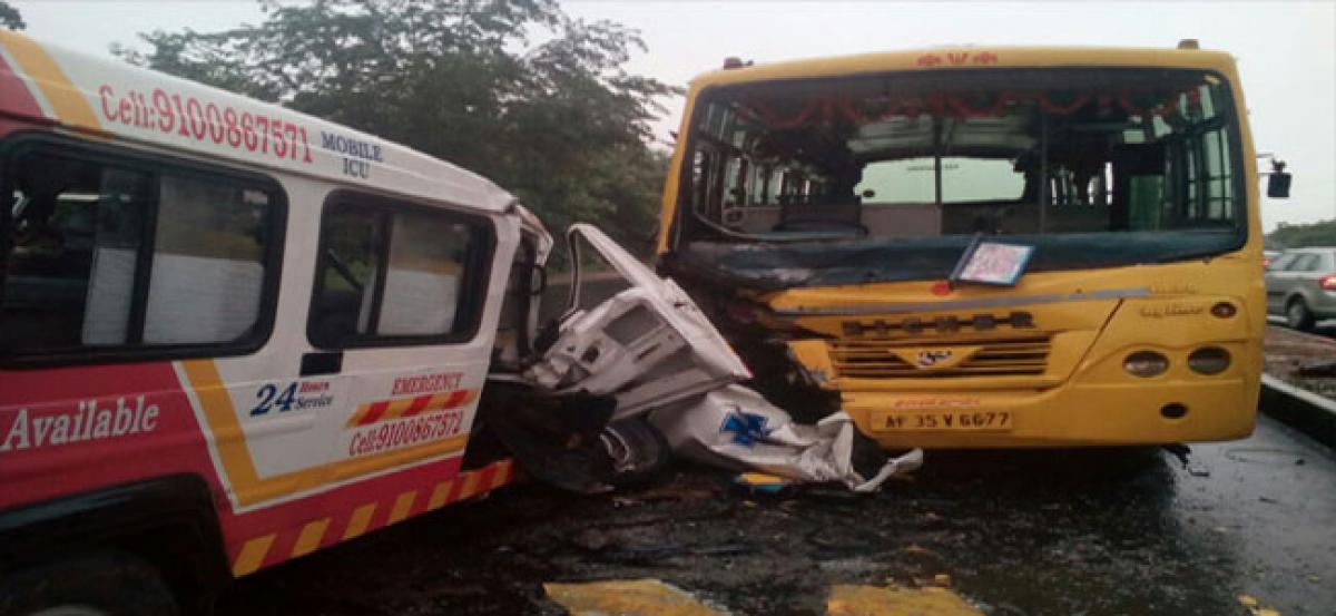 Three die as college bus hits ambulance