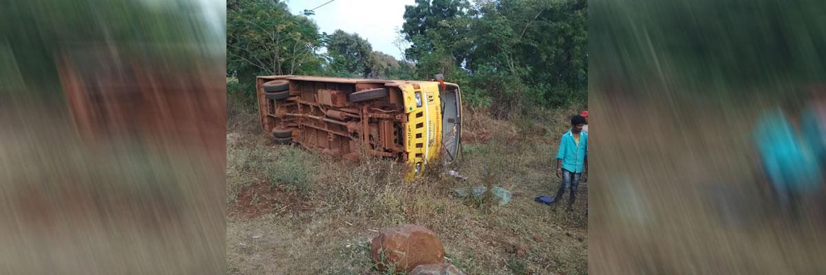 School bus turns turtle in Zaheerabad