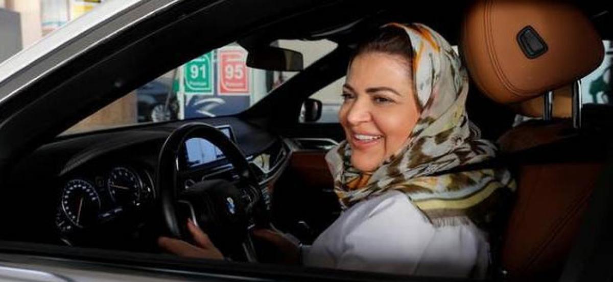 Saudi women drive their way to new freedom as ban ends