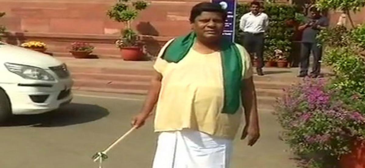Dressed as a cattle herder, TDP MP protests outside Parl