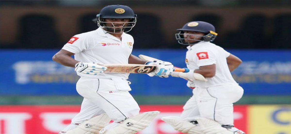 Mendis, Karunaratne lead Lankan fightback