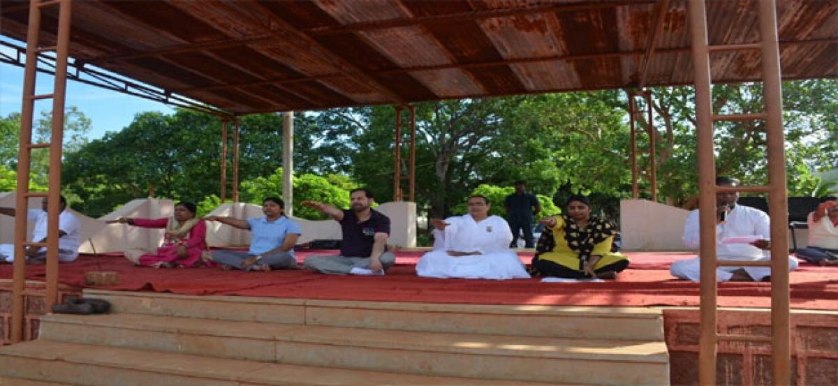 Vikarabad Collector advises people of all faiths to practise yoga for good health