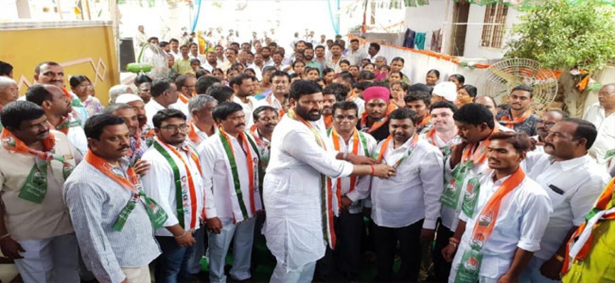 300 TRS activists join Congress