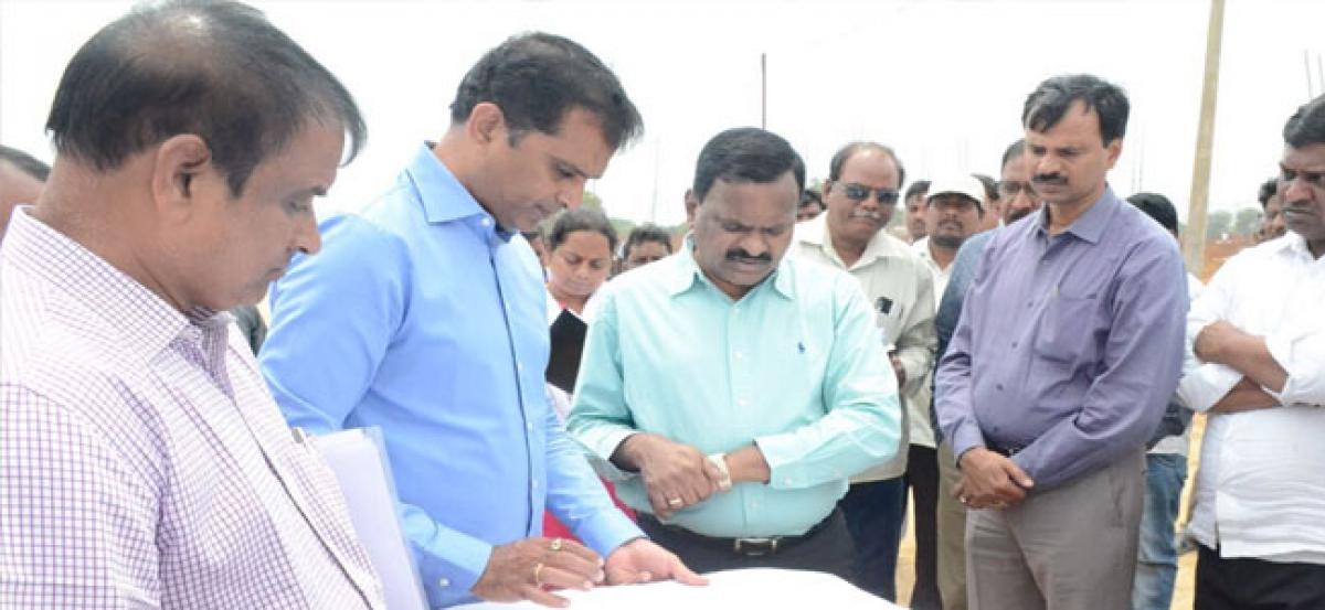 Collector inspects 2BHK houses construction site