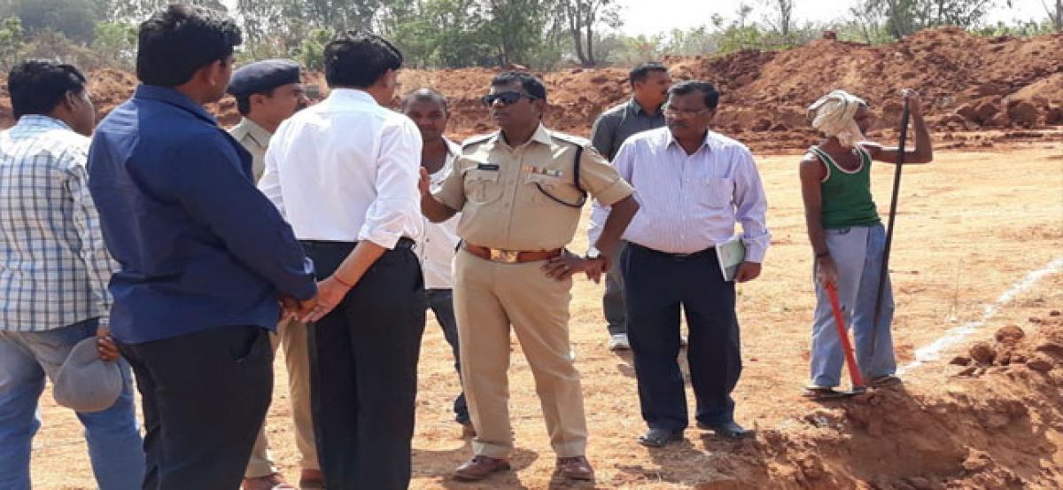 Commissioner inspects construction site