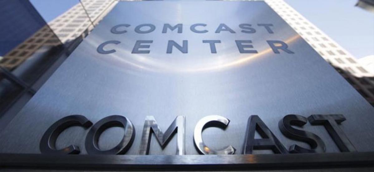 Comcast to pay advisers as much as 243 million pound for Sky takeover