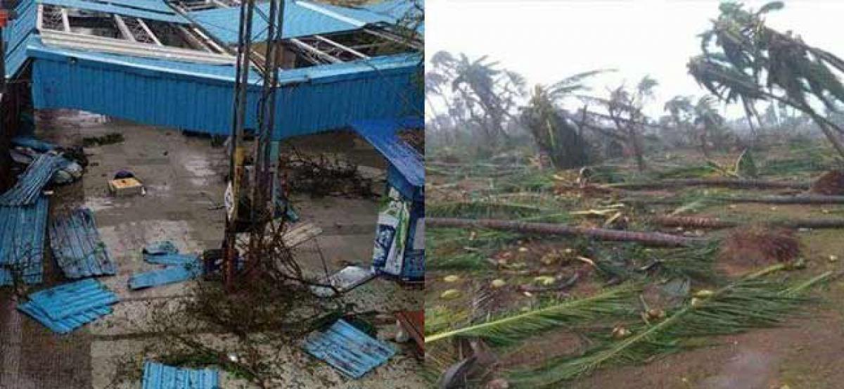 Will report cyclone damage to central government