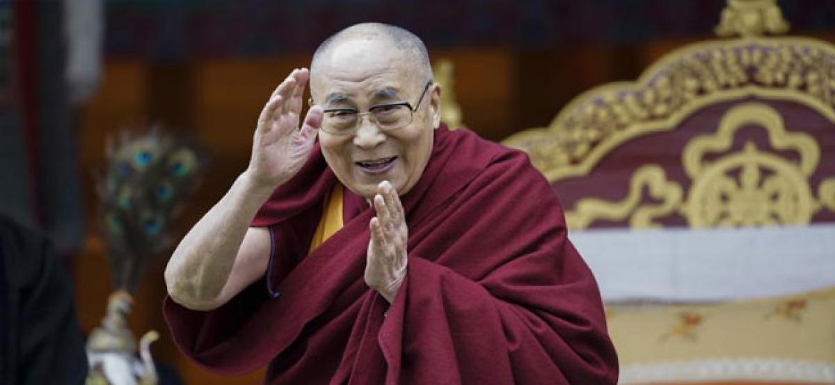 Dalai Lama free to carry out religious activities in India