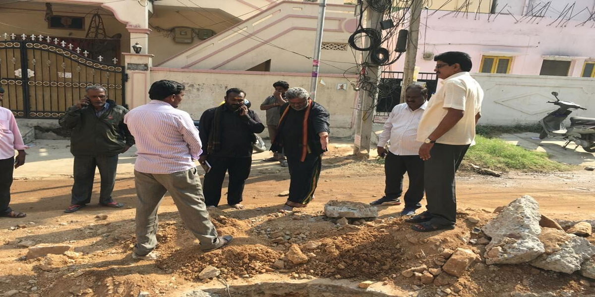 Corporator M Srinivas Rao inspects drainage work in Kukatpally
