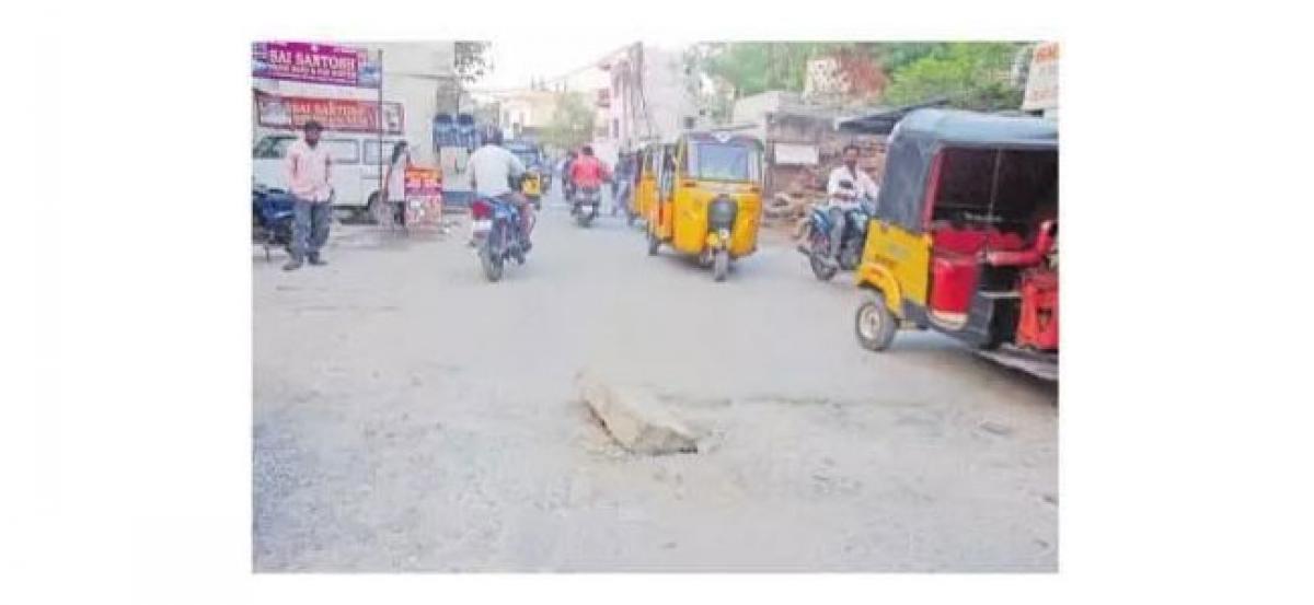 Potholes, damaged roads force commuters to take a bumpy ride