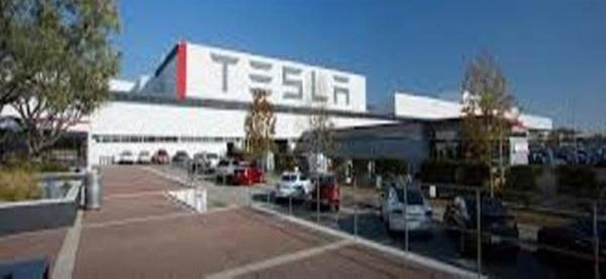 Tesla finally reaches Model 3 production goal