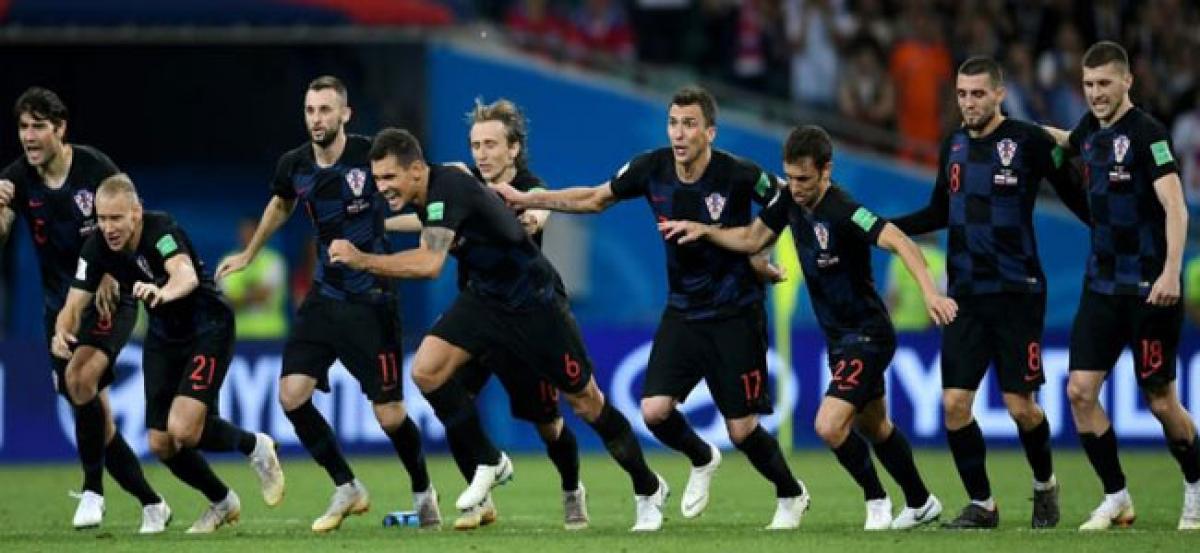 Croatia beat Russia on penalties to set up World Cup semi against England