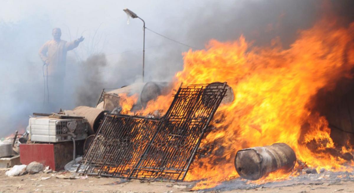 Four thatched huts gutted