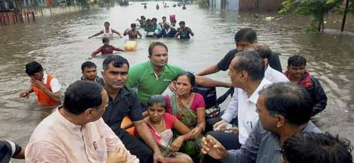 At least 120 killed in Gujarat floods; cotton farmers suffer heavy damage