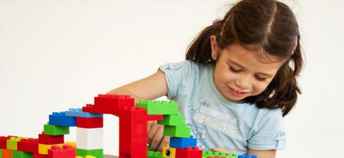 Games for children, engaging kids with building blocks helps their personality