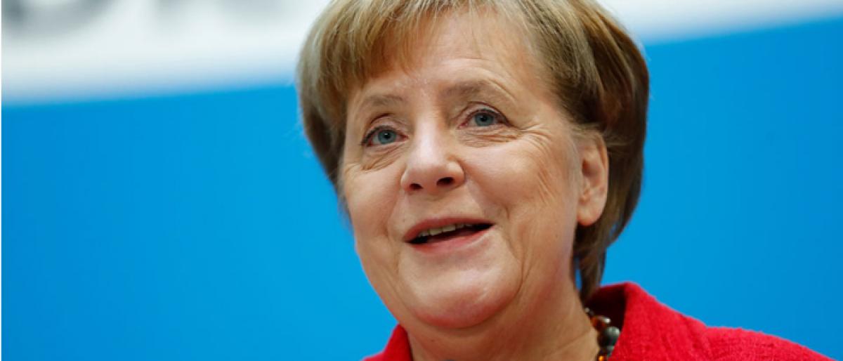 Germanys Merkel suspends arms sales to Saudi Arabia