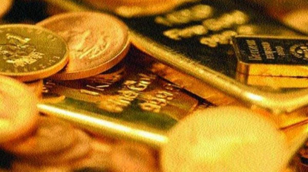 Gold futures soften by 0.08 per cent on global cues