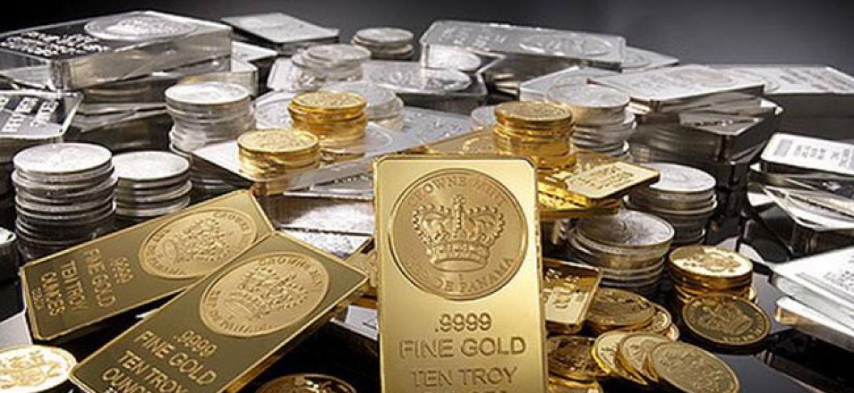 Gold maintains downtrend on weak global cues, muted demand
