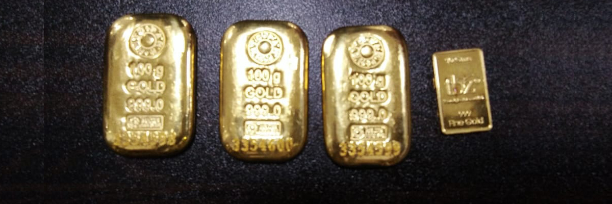 Customs officials seized 310 grams gold biscuits from a woman passenger at Shamshabad Airport