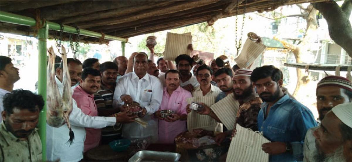 Corporator distributes steel boxes and jute bags