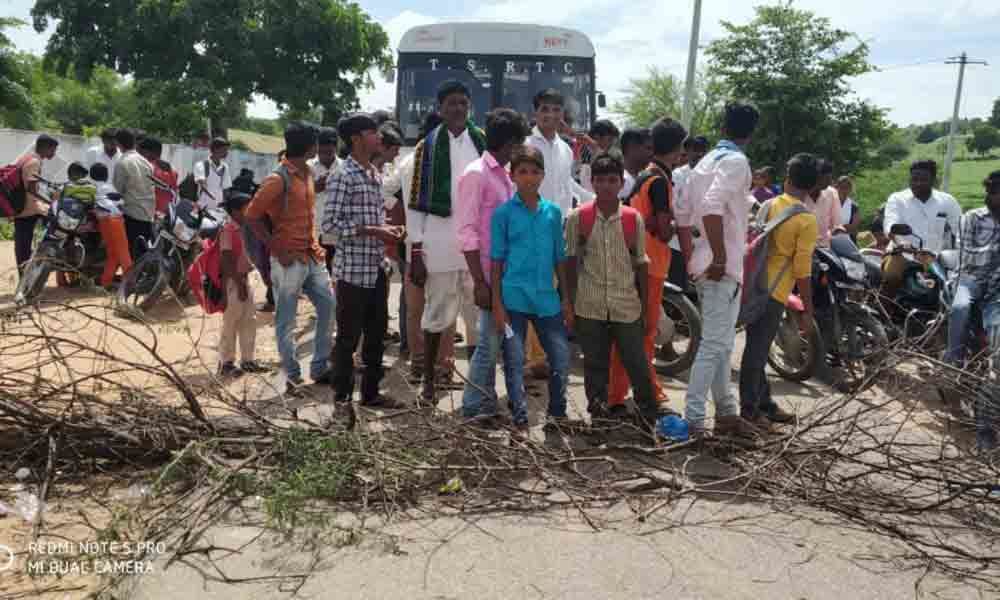 Perapallamidi villagers, children block roads demanding additional bus services