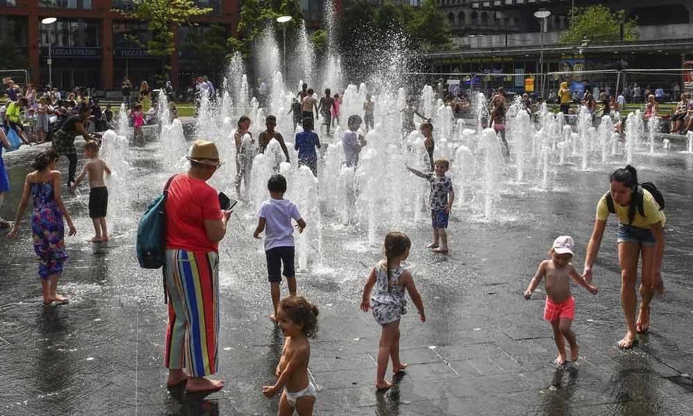 The Latest: Heat wave smashes weather records in Europe