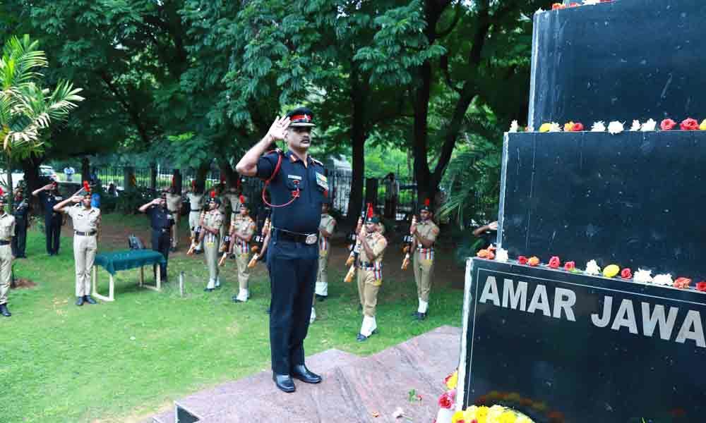 Tributes paid to Kargil martyrs by Commander Col Ganga Sathish