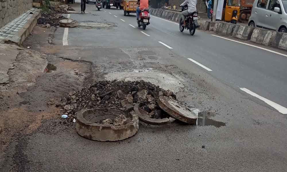 Old manhole cap left on main road