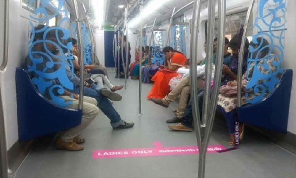 Men occupying ladies seats in Metro