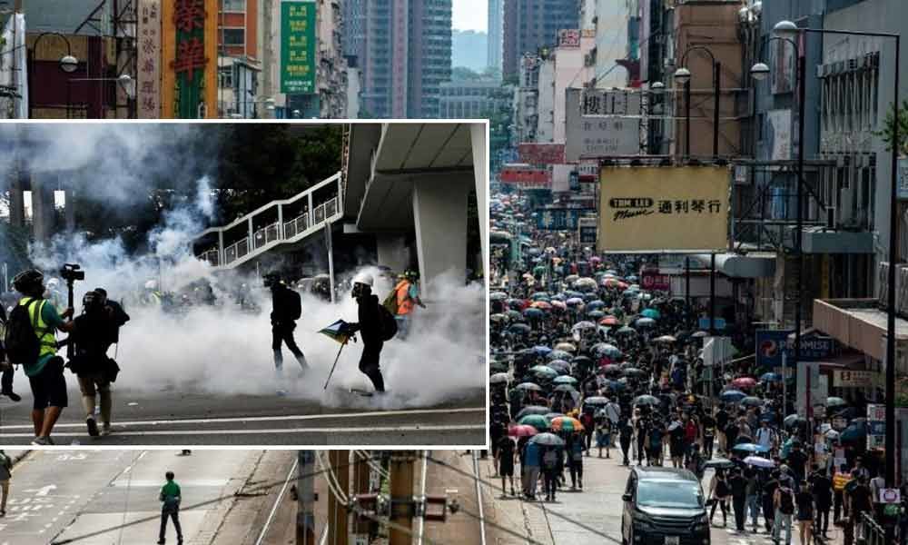 Police fire tear gas at Hong Kongers defying ban on anti-triad rally