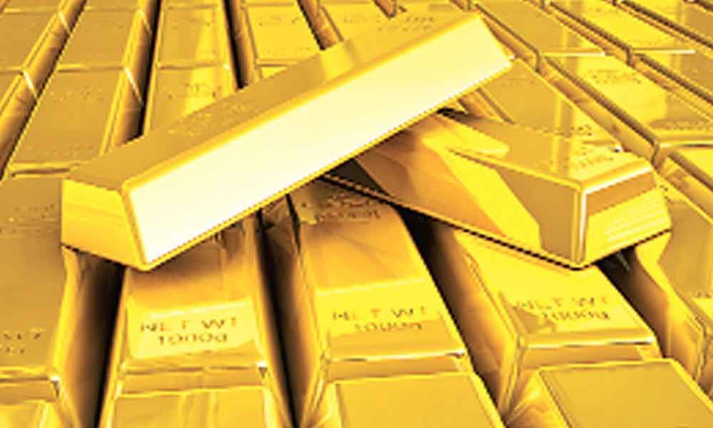 Gold prices fall marginally