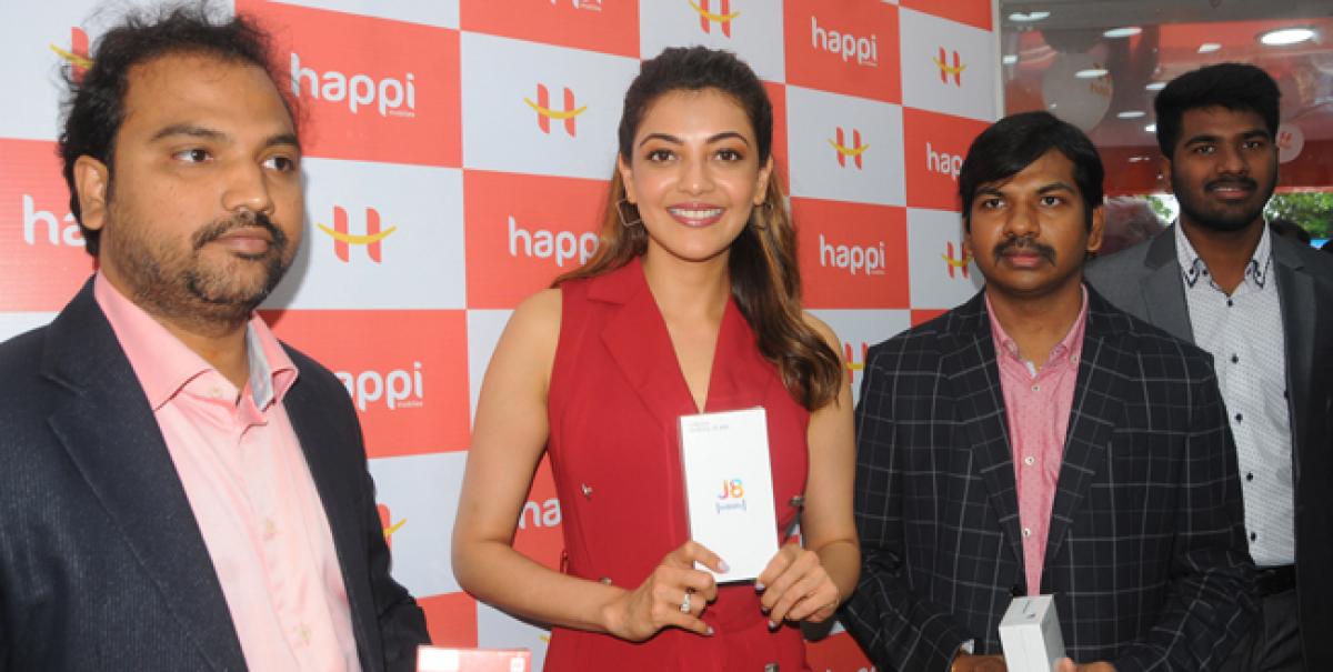 Kajal inaugurates Happi Mobiles outlet